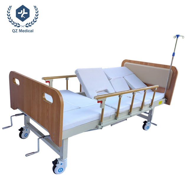 Lit de soins manuel &agrave; 3 fonctions avec dossier &agrave; 85&deg; et assistance au bassin - Cadre en acier lamin&eacute; &agrave; froid robuste, garde-corps pliables et roulettes silencieuses pour patients &acirc;g&eacute;s paralys&eacute;s